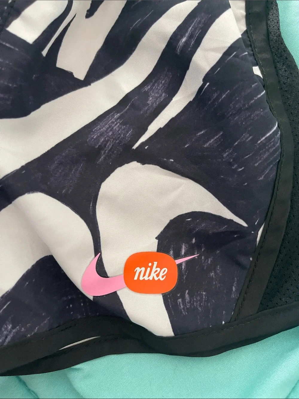 Nike Kids Black & White Graphic Swim Trunks with Pink Logo